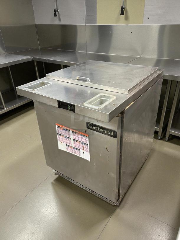 Continental SW27-8 refrigerated sandwich prep unit, 27", 7.4 cu ft, tested, stainless steel, good condition, visible label.