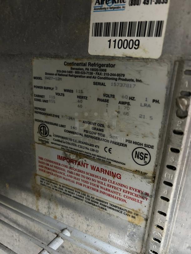 Continental SW27-8 refrigerated sandwich prep unit label showing model, power supply, and cleaning warning.