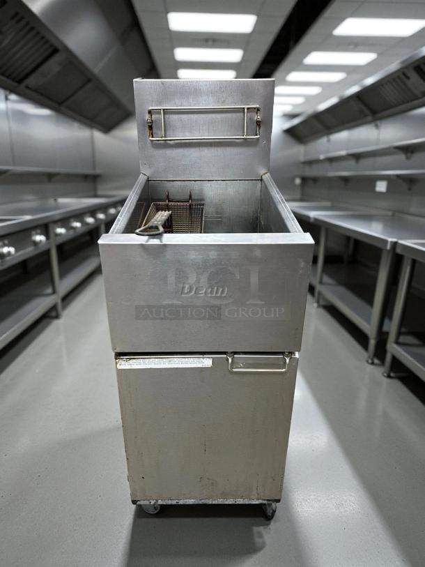 Dean SR152G gas fryer, 50 lb vat, floor model, liquid propane. Excellent condition. Brand logo visible, on casters.