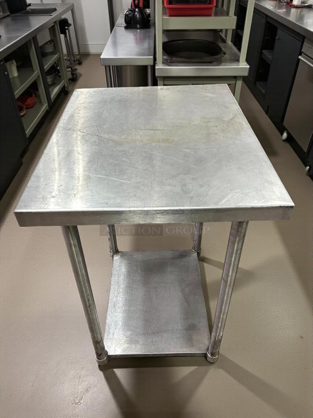 Eagle Group stainless steel worktop table, excellent condition, with undershelf. Smooth surface, ideal for kitchen use.