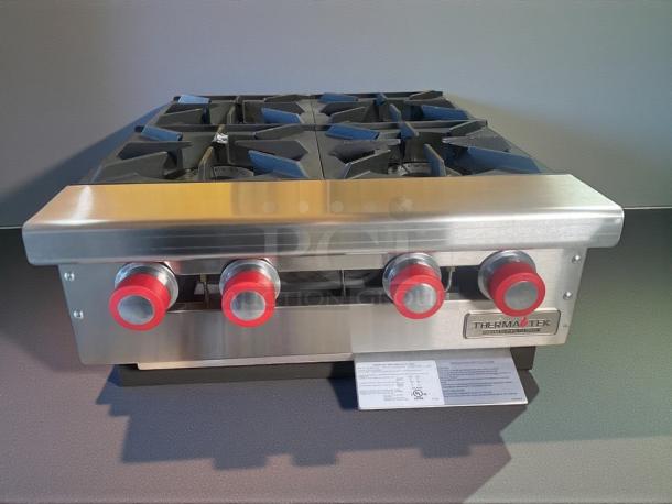 Brand new Therma-Tek TCHP24-4 countertop gas hotplate with 4 burners, stainless steel, original packaging visible.