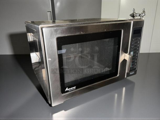 Amana RFS12TS 1200w commercial microwave, stainless steel, touch pad, 120v, tested, working condition, Amana logo visible.