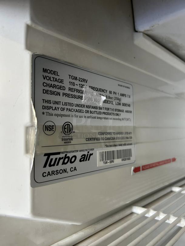 Turbo Air TGM-22RV(B)-N6 glass door cooler, 20.3 Cu.Ft, label detailing model and voltage, immaculate condition.