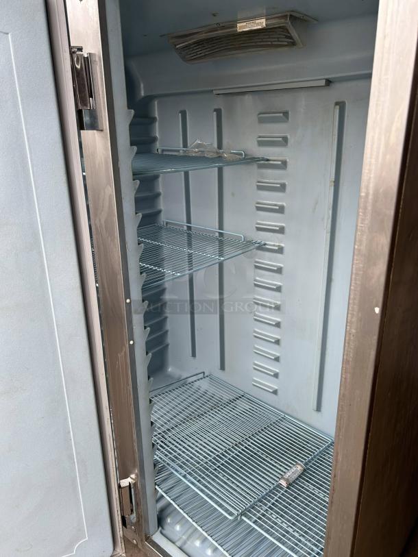 Delfield 6151XL-S 50" reach-in freezer in outstanding condition, showing interior shelves. Fully tested and working.