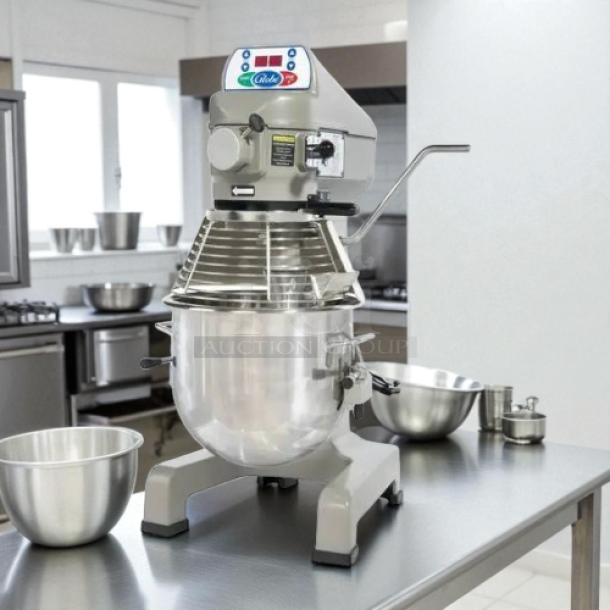 Globe SP20 20-Qt commercial planetary mixer in outstanding condition, 110V, fully tested, visible controls and mixer attachments.