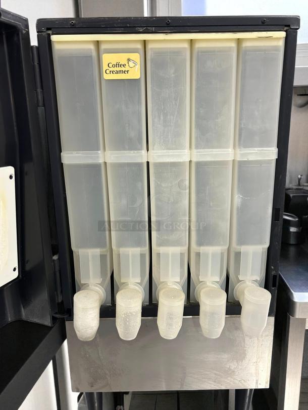 United Food Group powder dispenser, model UV-PSPD-5-AV-BL-T-B. Prime condition, 120V, fully tested. Features five compartments for dispensing.