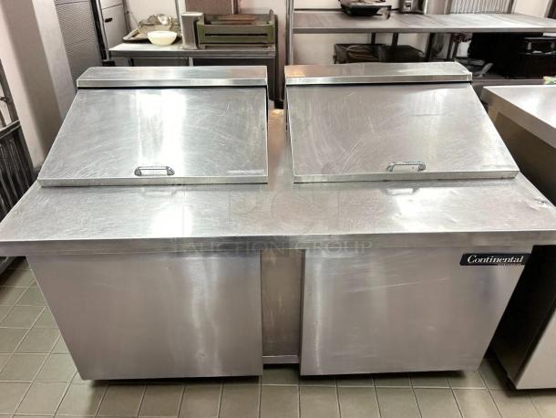 Prime condition Continental Refrigeration sandwich prep table with dual lid, stainless steel, fully tested and working.
