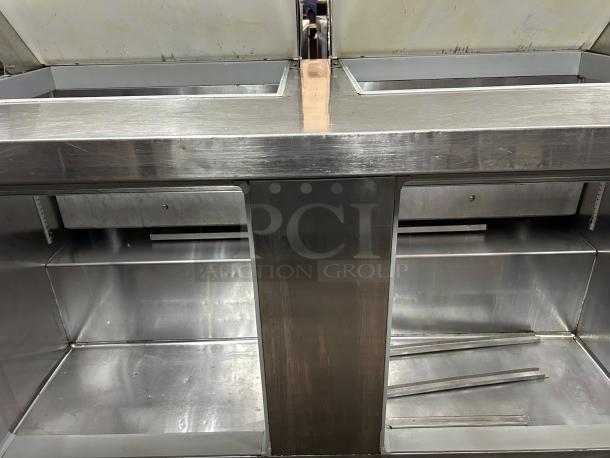 Continental Refrigeration sandwich prep table, dual lid, stainless steel, prime condition, fully tested and working.
