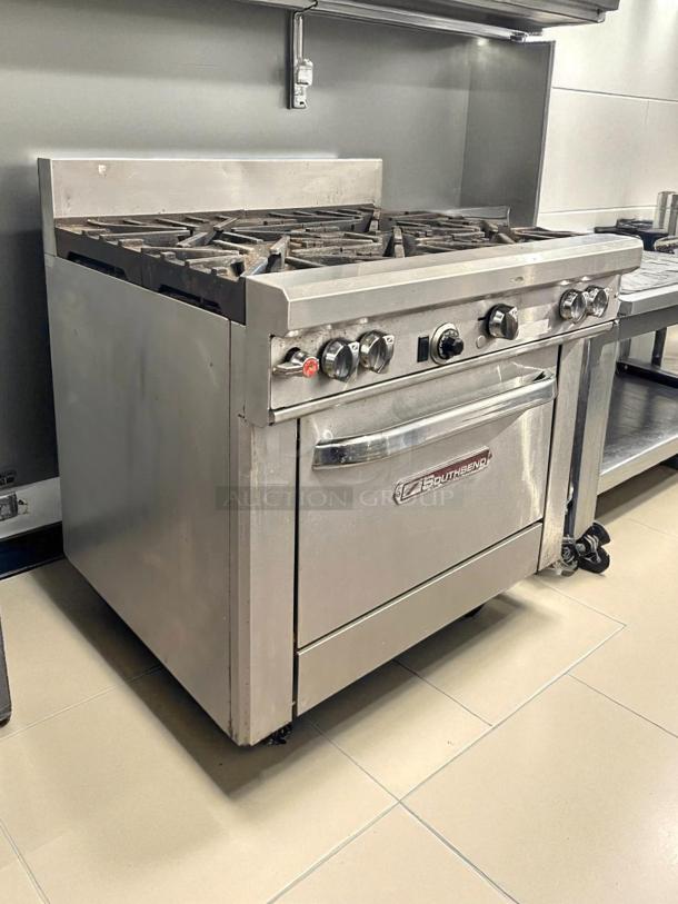 Southbend S36D gas restaurant range, 36", 6 burners, with standard oven. Pristine condition, fully tested. Southbend branding visible.