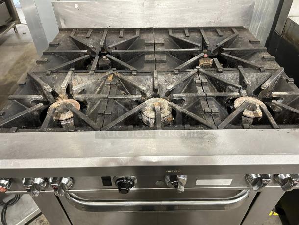 Southbend S36D 36" 6-burner gas range with standard oven, pristine condition, fully tested and working, stainless steel.