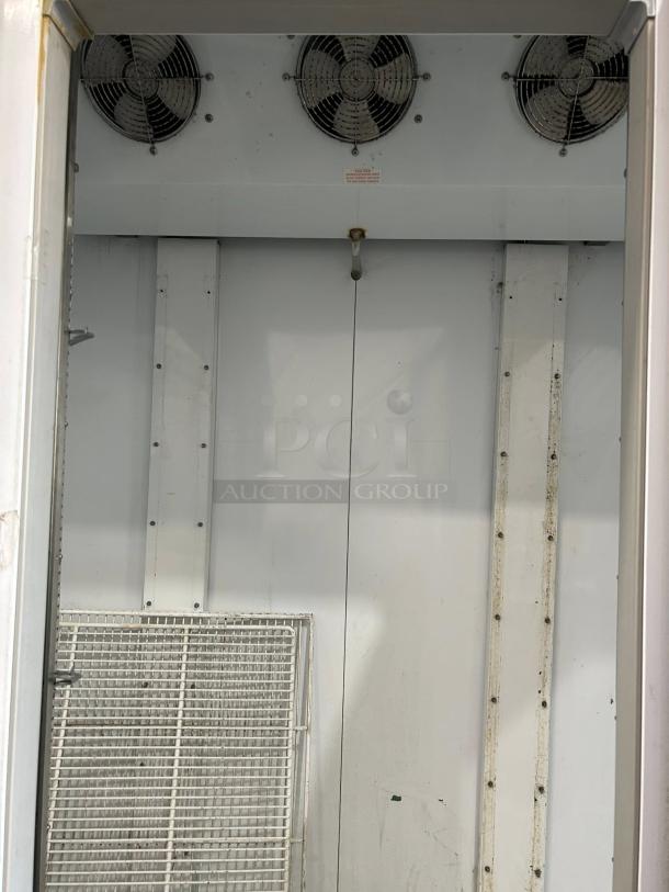 Beverage-Air CRG74-1 refrigerator interior with three fans and white shelving, in great condition, fully tested.