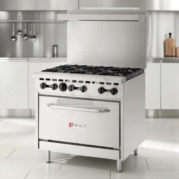 Wolf 36" 6-burner gas restaurant range, natural gas, standard oven, prime condition, fully tested and working.