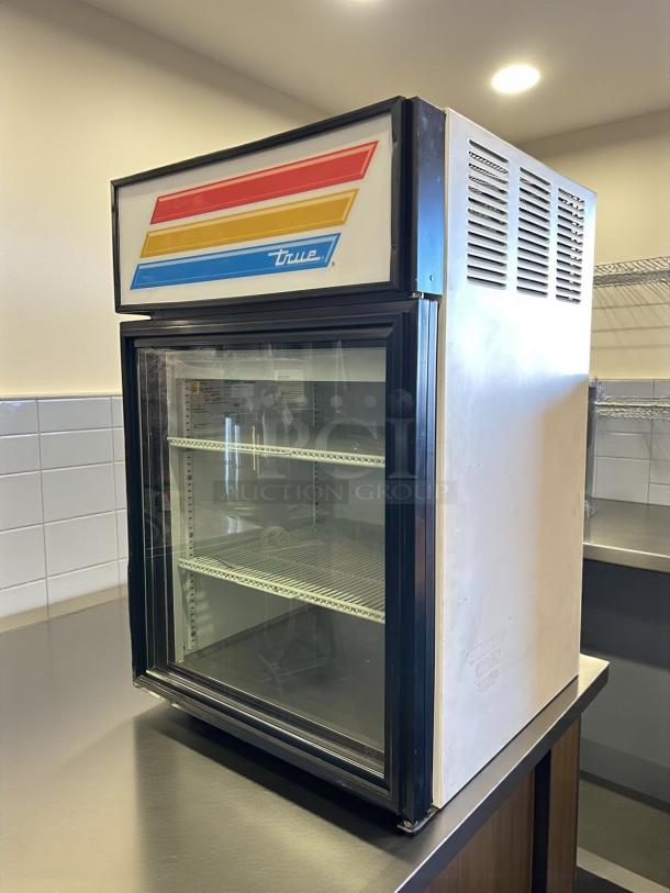 True GDM-05-LD single door glass refrigerator, superb condition, 115V, fully tested, with colorful branding on top.