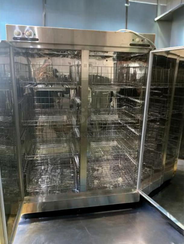 Tang Machinery high-temp drying & sterilizing cabinet in superb condition, stainless steel, open door view, fully tested.