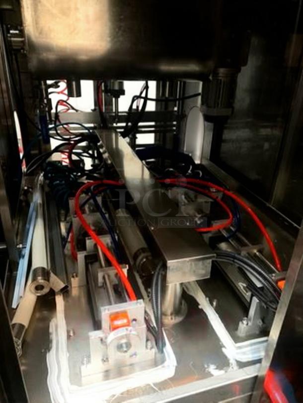 Tang Machinery Dual-Nozzle Automatic Pneumatic Filling System, superb condition, precision volume filling for sauces and liquids.