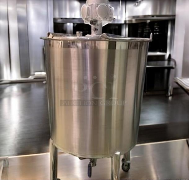 Stainless steel mixing tank by Tang Machinery with top-mounted agitator, superb condition, part of a 9-piece production line.