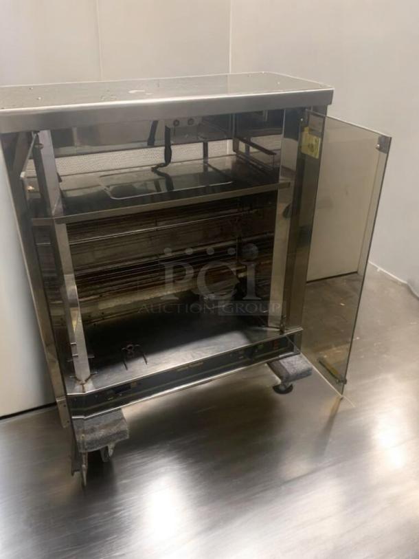 Commercial 2-spit electric chicken rotisserie oven in great condition, fully tested and working. Stainless steel, glass door.