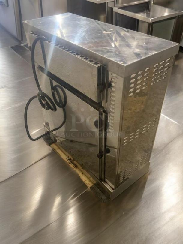 Commercial 2-spit electric chicken rotisserie oven in great condition. Stainless steel exterior. Fully tested and working.