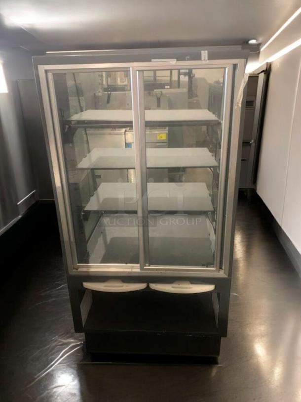 Refrigerated bakery/deli display case, full glass front, multi-shelf, superb condition, tested and working.