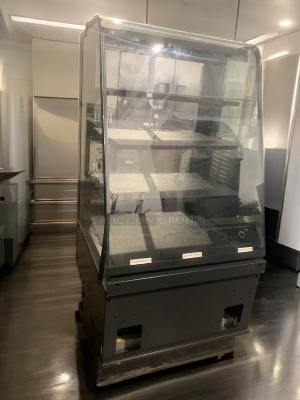 Refrigerated bakery/deli display case, superb condition, full glass front, multi-shelf, tested and working.