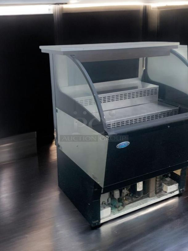 Federal Industries refrigerated open display case in prime condition, fully tested and working. Clear glass and metal design.