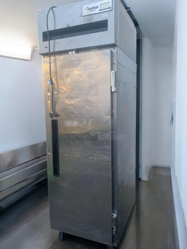Prime condition Delfield 6025XL-S single door reach-in refrigerator, 115V, fully tested and working. Model label visible.