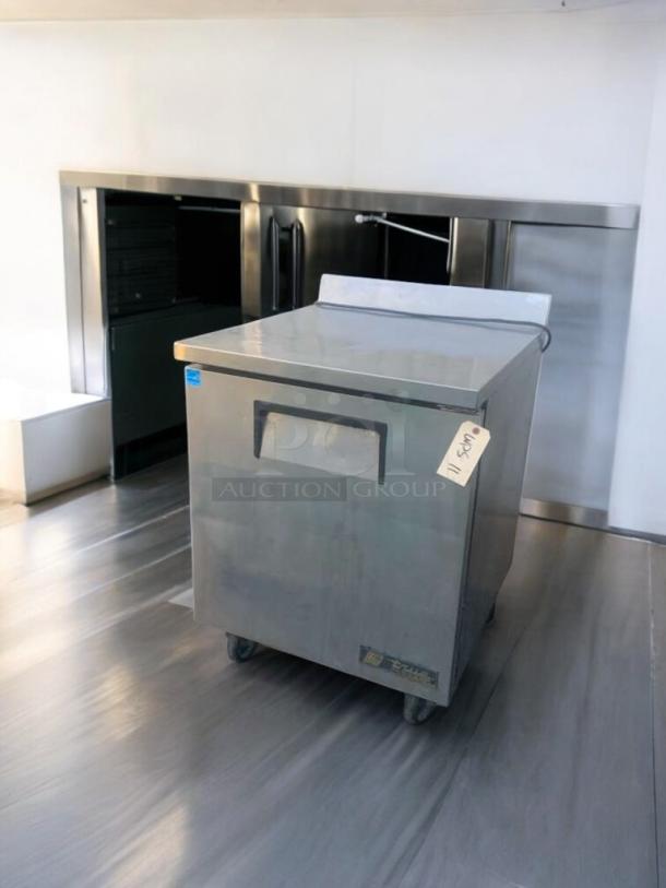 True TWT-27F one-door worktop freezer, prime condition, stainless steel, fully tested, 115V, tag indicating model.