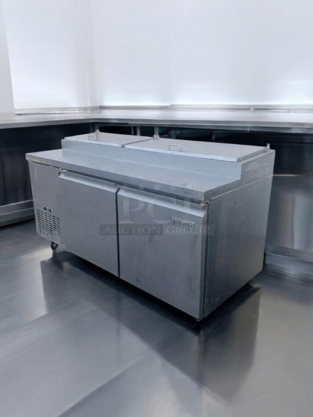 Prime condition Delfield UCD4448N 48" refrigerated pizza prep table, fully tested, 115V, stainless steel, dual doors.