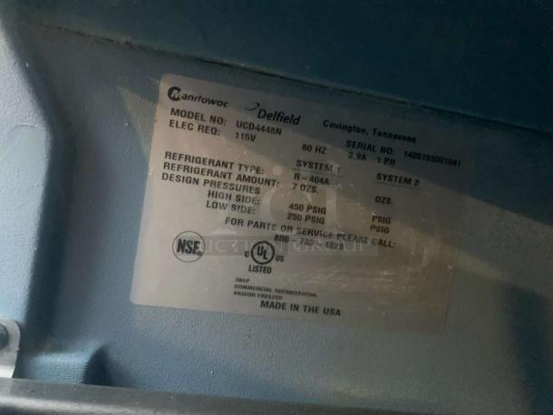Delfield UCD4448N label showing model, voltage, refrigerant type. NSF, UL certified. Made in USA. Fully tested, working.