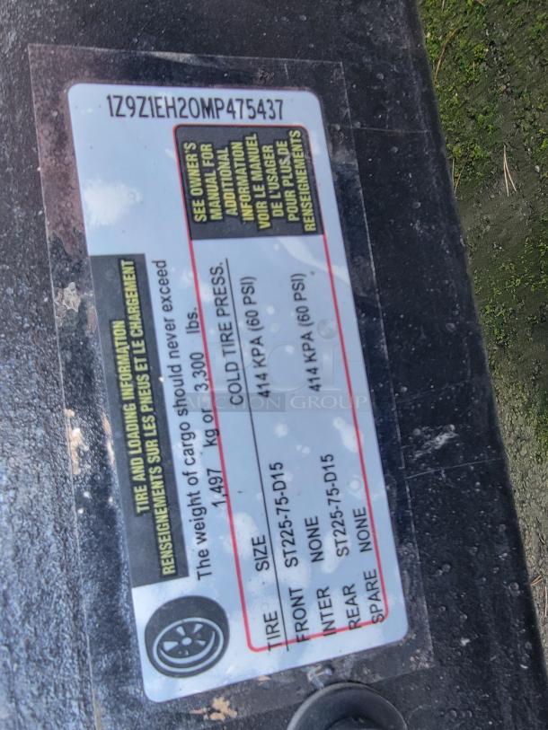 Label showing tire and loading information for a 2021 Quality 16' mobile kitchen trailer, VIN: 1Z9Z1EH20MP475437.