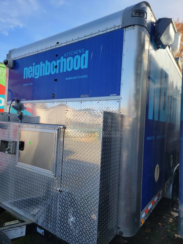 2021 Quality Model 16 mobile food trailer, branded "Neighborhood Kitchens," stainless steel exterior, service window.