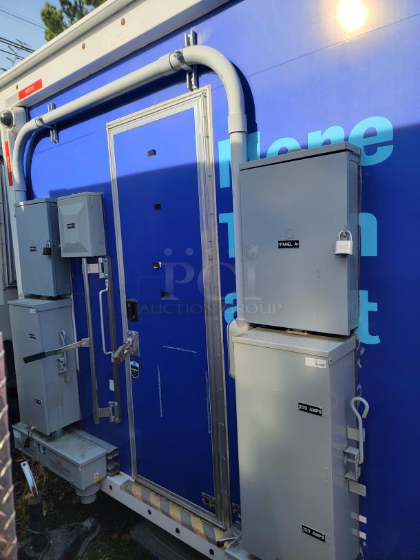 2021 16' Quality mobile ghost kitchen trailer, featuring external electrical panels with 200 AMP shore power setup.