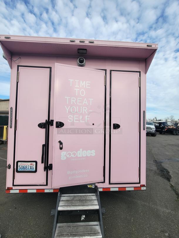 2021 SDG 'Goodees' retail/food trailer in pink, showing rear with "Time to Treat Yourself" text, rear pink doors, step system, and security camera.