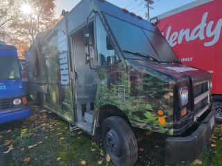 2004 Freightliner MT45 Step-Van mobile kitchen with nature-themed wrap. Features robust diesel engine, stainless steel interior, and commercial kitchen setup.