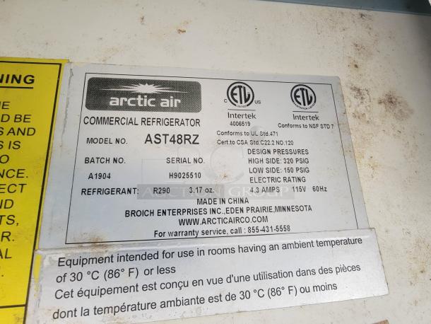 Arctic Air commercial refrigerator label, model AST48RZ, refrigerant R290, serial H9025510, made by Broich Enterprises.