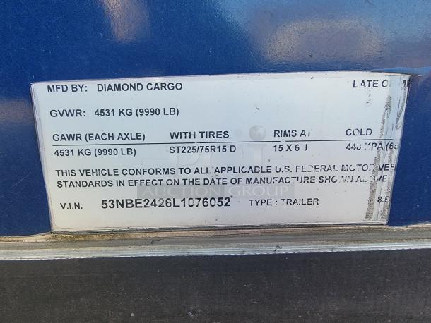 VIN label on 2020 Diamond Cargo 24' mobile kitchen trailer. GVWR: 9990 lbs, GAWR: 9990 lbs, tire specs listed.