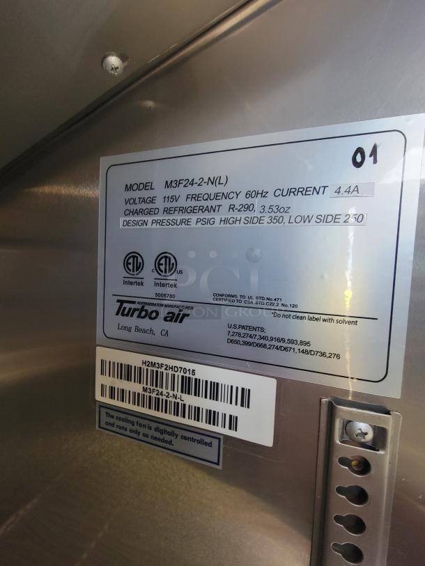 Turbo Air model M3F24-2-N(L) label showing 115V, 60Hz, 4.4A specs, R-290 refrigerant. Features digitally controlled fan.