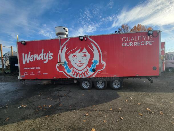 2021 Texino 28-ft food trailer with Wendy's branding, fully equipped with commercial kitchen appliances. Ready for high-volume use.