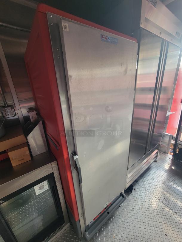 2022 Rock Solid 28' food trailer interior with new Metro C5 Series commercial refrigerator. Never used, pristine condition.