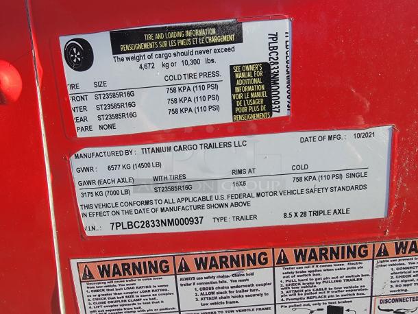 28' Titanium Food Trailer label shows 2021 manufacture, triple axle, GVWR 6577 kg, VIN 7PLBC2833NM000937.
