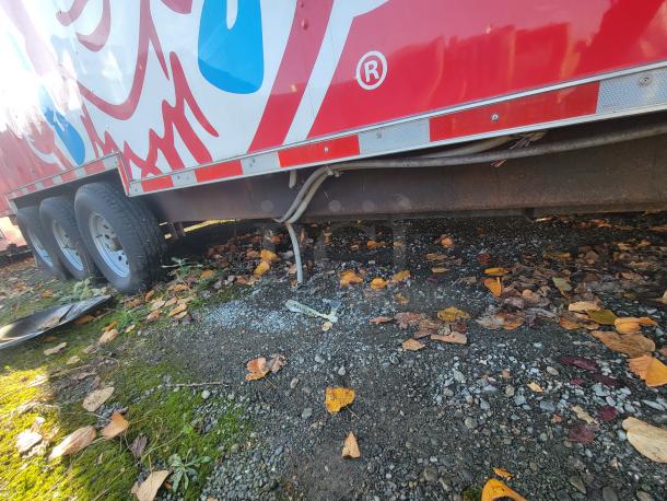 2021 Titanium 28' food trailer, pristine condition, unused equipment, professional-grade interior, vibrant exterior design.