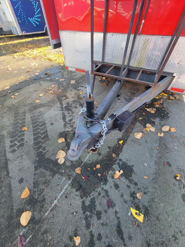 2021 Titanium 28' food trailer hitch and front view, pristine condition, with diamond plate detailing. Unused and fully equipped.