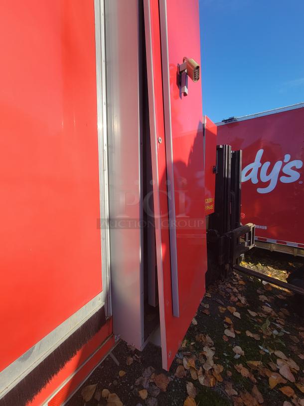 Red Titanium 28' food trailer, pristine condition, 2021 model. Unused equipment inside, fully equipped professional-grade kitchen.