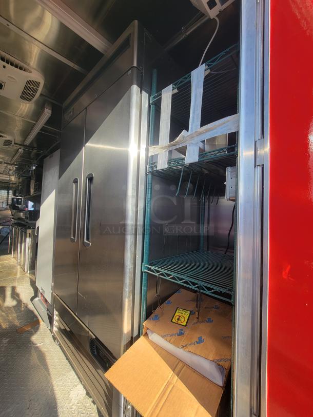 2021 Titanium 28' food trailer with unused, factory-protected equipment, professional-grade interior, pristine condition.