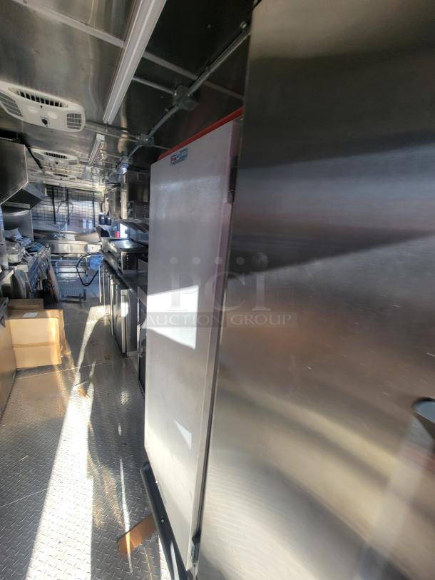 2021 Titanium 28' food trailer, as-new condition, professional-grade, unused equipment with factory protection, custom-built.