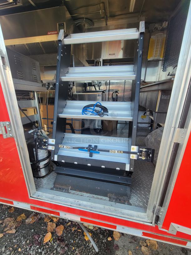 2021 Titanium 28' food trailer, pristine condition, unused equipment with factory protective material, professional-grade interior.