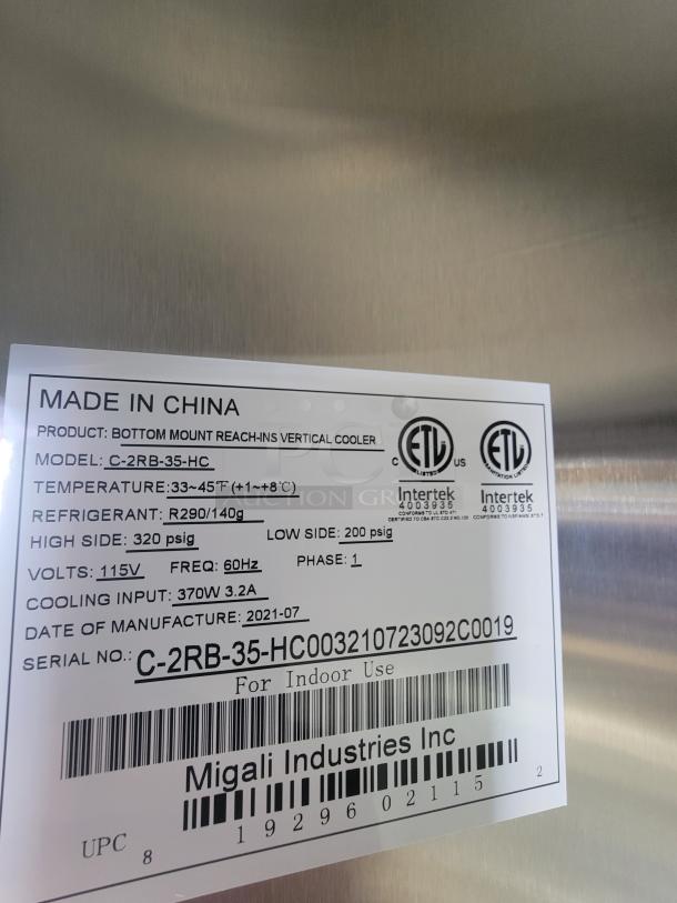 Label on the interior equipment of a 2021 Titanium 28' food trailer, showing model, voltage, refrigerant details, and more.