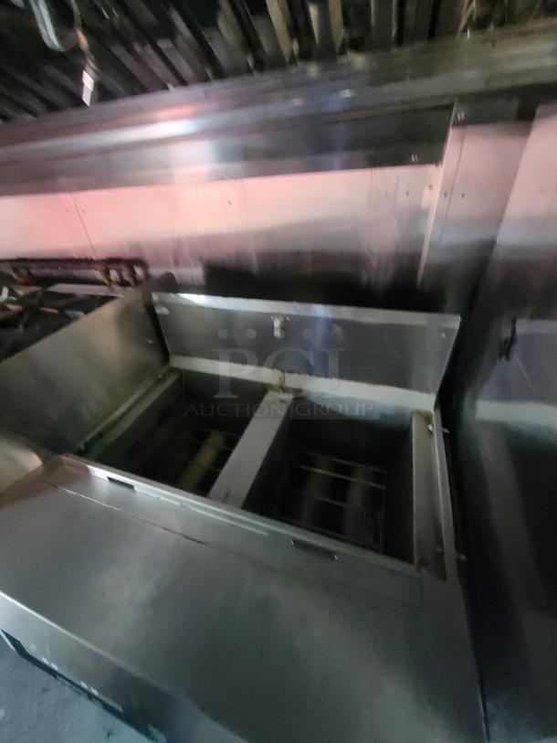 2003 Chevrolet Workhorse P24 food truck interior with commercial kitchen equipment, stainless steel, well-maintained.