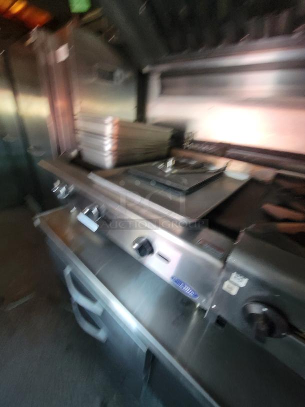 2003 Workhorse diesel food truck interior, featuring a fully-equipped commercial kitchen build-out on a Chevrolet P24 chassis.