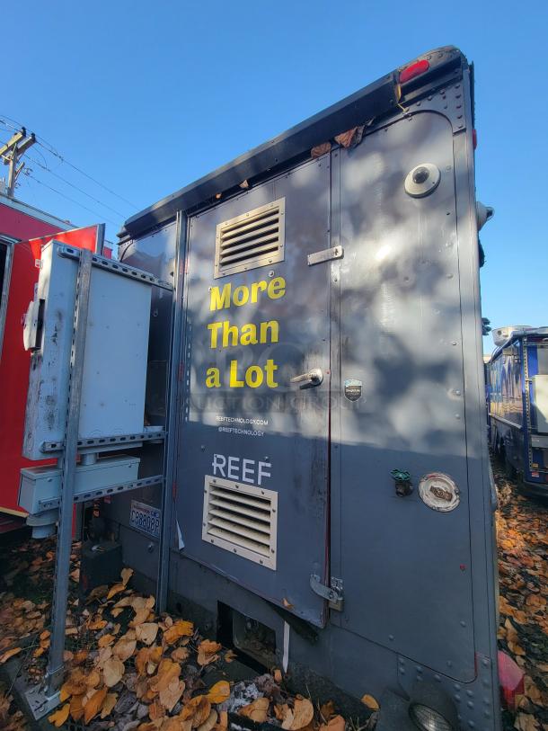 1973 International Step Van, fire-damaged mobile kitchen, "More Than a Lot" and "REEF" markings. Salvage project.